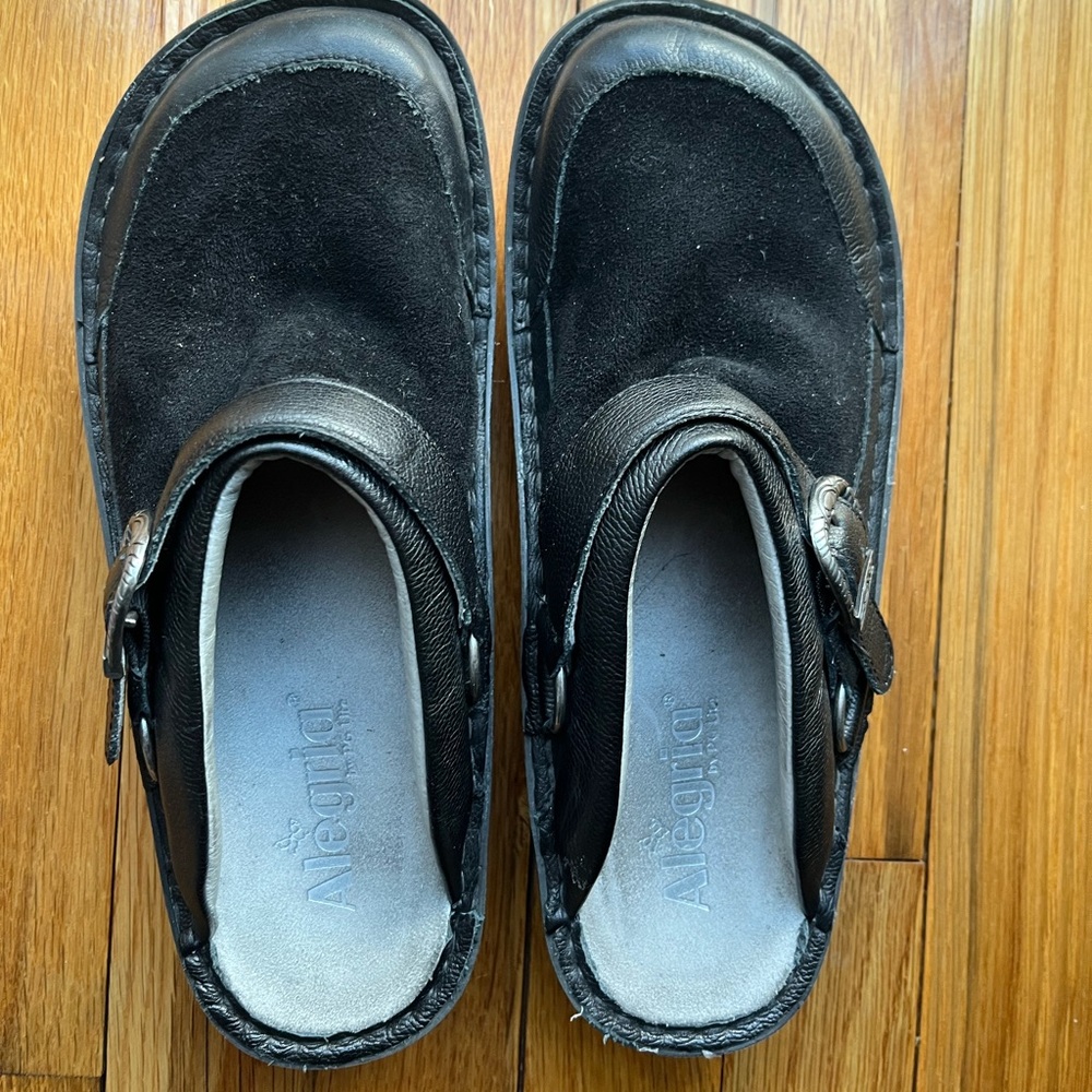Algeria clogs. Basicllly new. Worn once. Great arch support